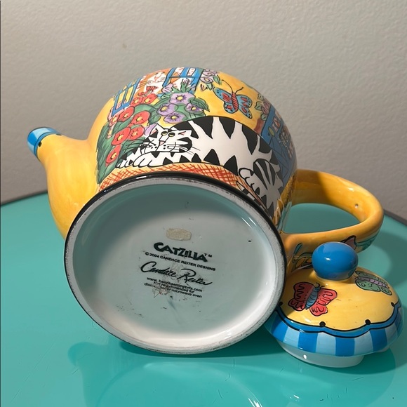 Vibrant Yellow and Blue Ceramic Teapot with Whimsical Designs - Picture 5 of 6